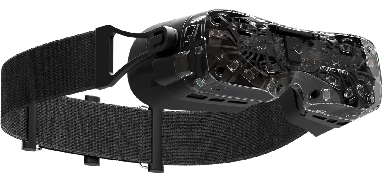Bigscreen Beyond 2 headset with a clear shell showing its internal boards, on a black fabric head strap