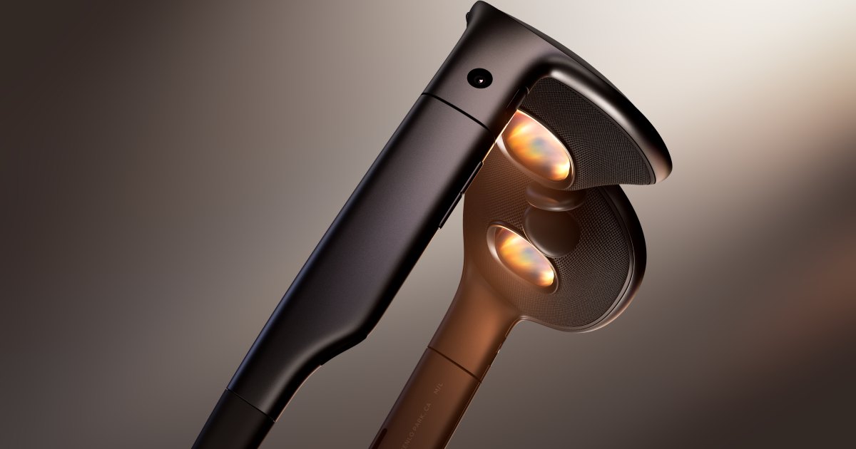 A close view of the inside of Meta VR Glasses, showing the two lenses glowing orange, the nose bridge and the temple arm