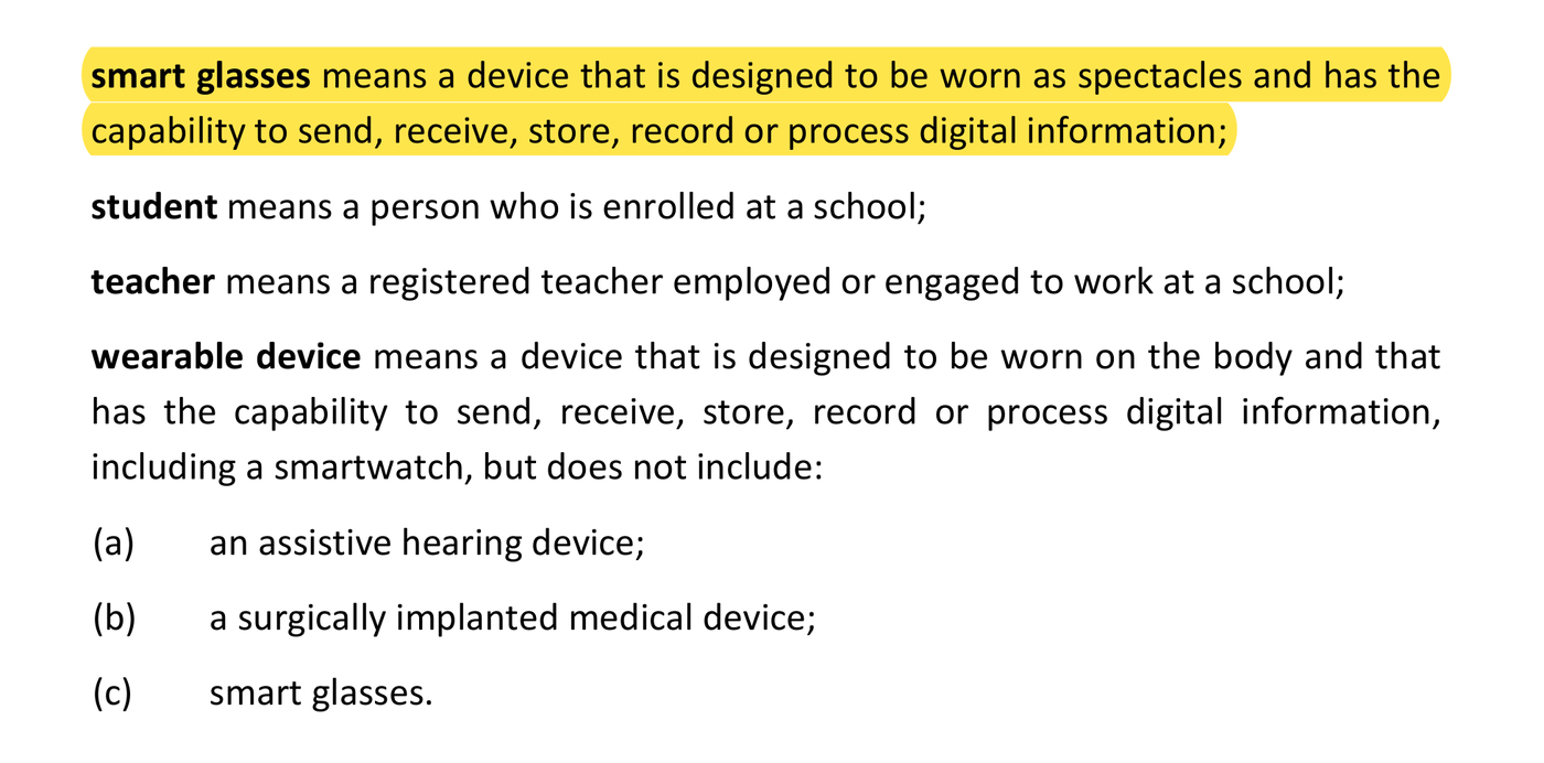 Excerpt of Victoria's Ministerial Order No. 1515 with the definition of smart glasses highlighted, above the definition of wearable device and its exclusions for assistive hearing devices, surgically implanted medical devices and smart glasses